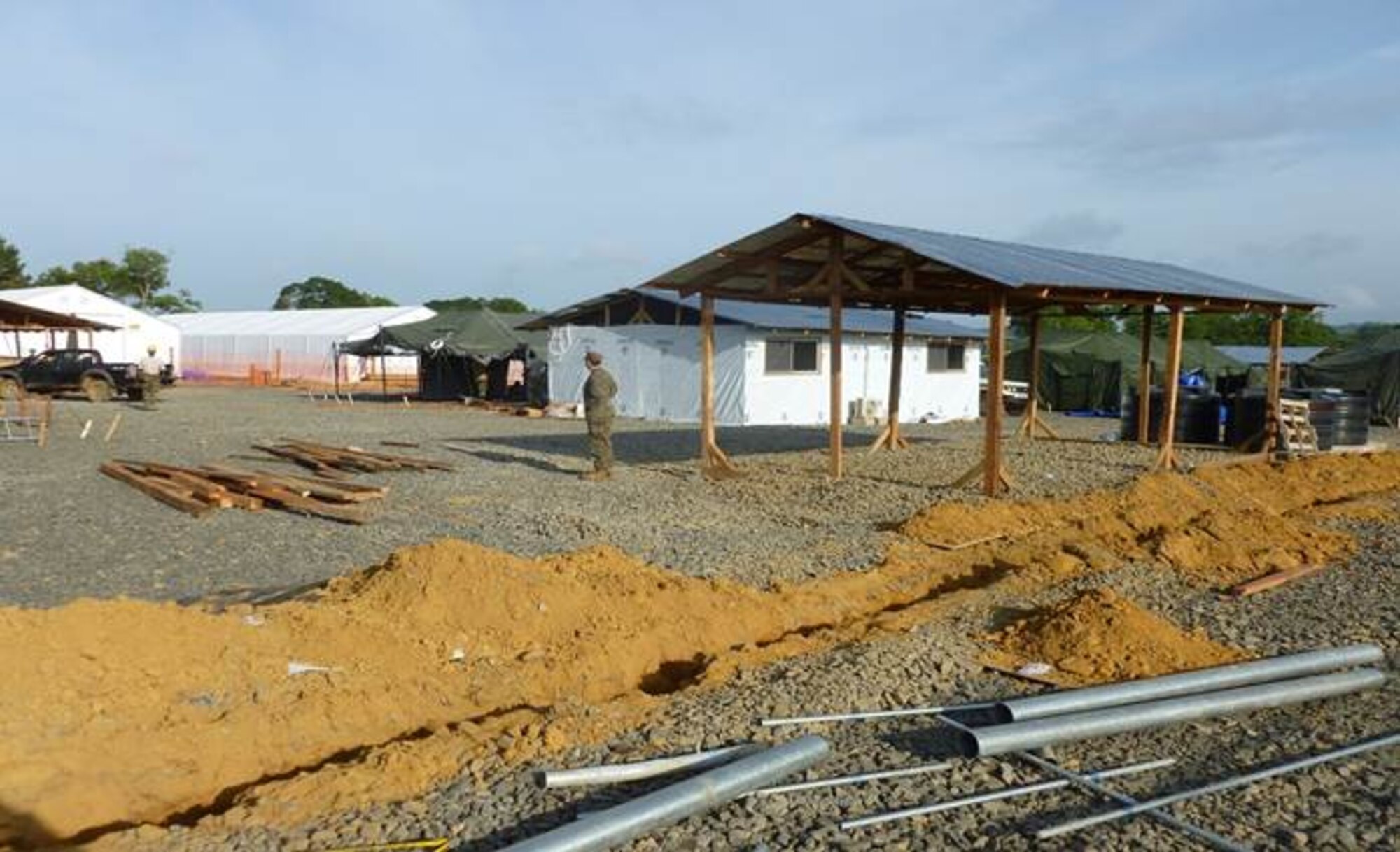 As a part of Operation United Assistance, 11 U.S. Air Forces in Europe and Air Forces Africa Airmen, assisted in building Ebola treatment facilities, during a 60-day deployment in Liberia, Africa. After staying in controlled monitoring for 22 days, the Airmen were allowed to return to their home stations, Dec. 14, 2014. (Courtesy photo)