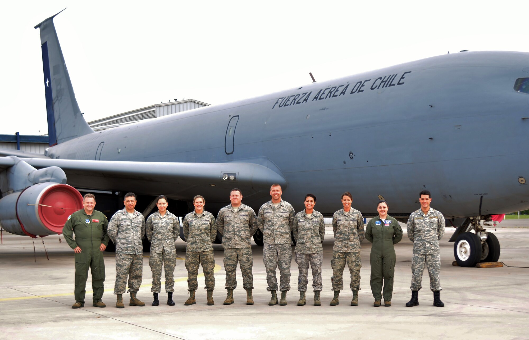 121st Air Refueling Wing Airmen pose with members of the Chilean Air Force in front of a Chilean KC-135 Stratotanker Oct. 5, 2014,  at Pudahuel Air Base, Chile. (Photo Submitted)