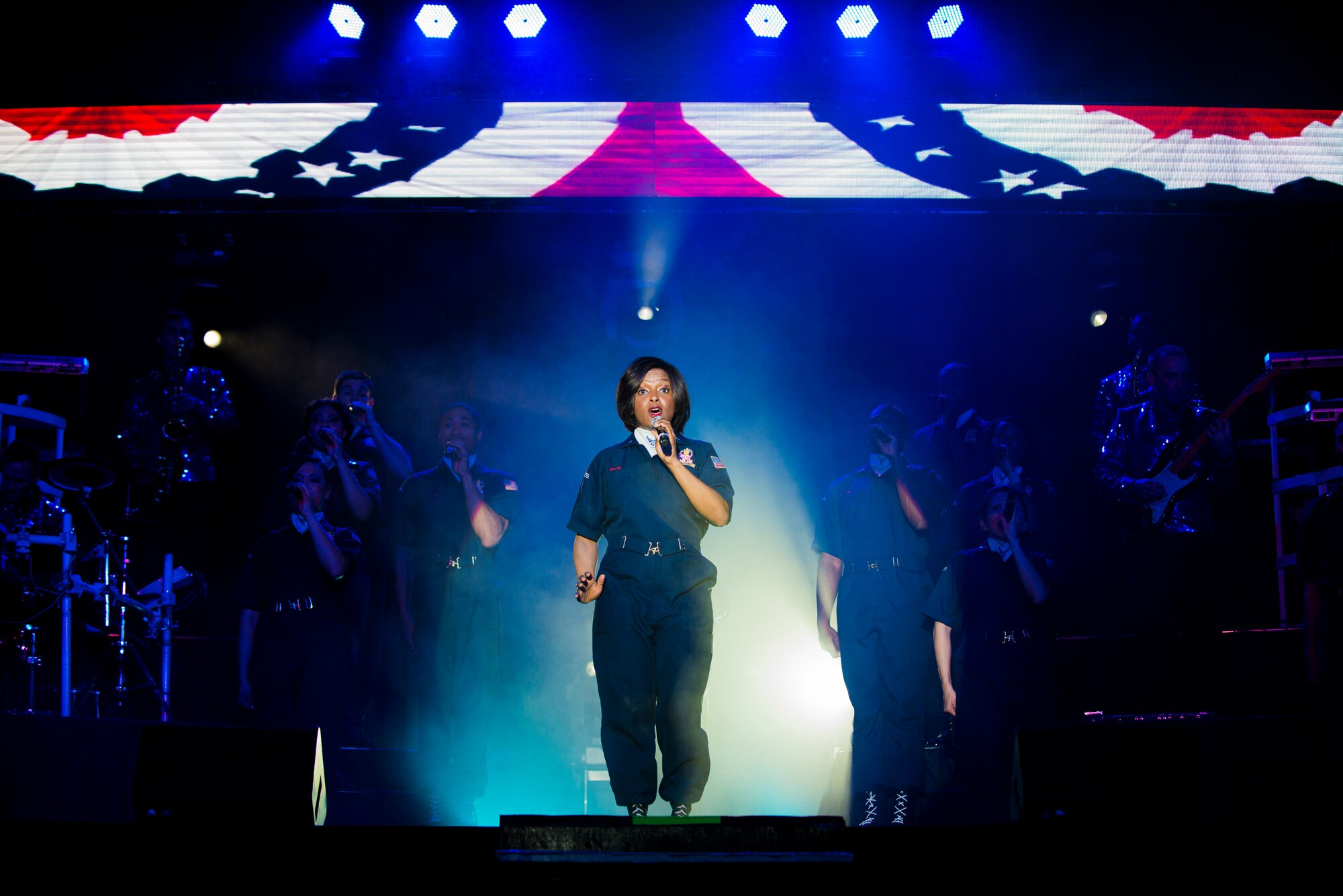 Tech. Sgt. Altrameise Myers, 920th Mission Support Group knowledge operations management craftsman, performs during a Tops In Blues show Dec. 13, 2014, at Incirlik Air Base, Turkey. For 60 years, Tops In Blue Airmen have entertained service members and their families, coalition partners and audiences around the globe. (U.S. Air Force photo by Airman Cory W. Bush/Released)