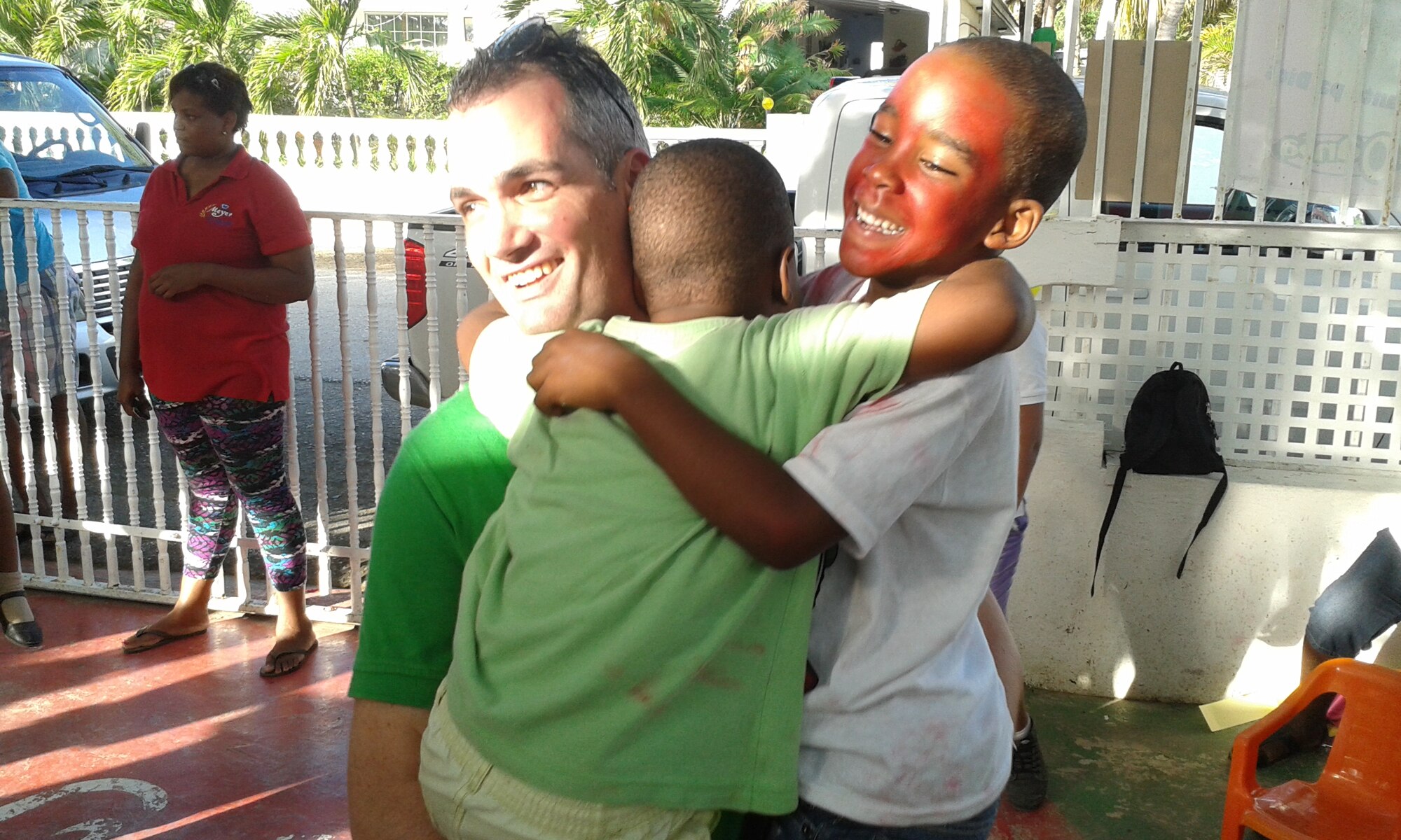 Children from the Fuik Children’s Center embrace a volunteer from the U.S. Forward Operation Location during their annual Sinterklaas Celebration Dec. 4, 2014. Eight volunteers from the USFOL visited the children and staff of the center, which provides a safe after-school environment for children, to decorate and assist with face painting. Sinterklaas is an annual celebration held the day before Saint Nicholas Day and includes gift giving and a visit from Saint Nicholas. Participating in activities such as these demonstrates the USFOL team’s desire for community involvement and their gratitude for the hospitality they receive from the citizens of Curacao. (Courtesy Photo)

