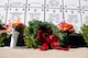 Wreaths lay on gravestones after the Wreaths Across America ceremony at Georgia National Cemetery in Canton, Ga. Dec. 13, 2014. Wreaths Across America occurs the second Saturday of December every year. (U.S. Air Force photo/Senior Airman Daniel Phelps)