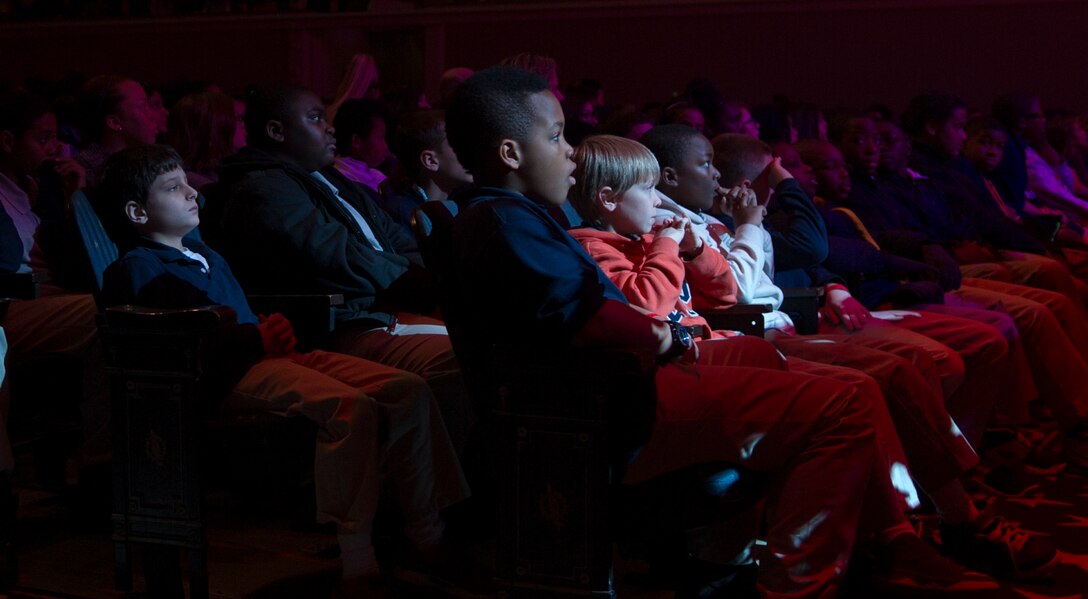 Children watch “The Spirit of the Season” holiday concert performed by the United States Air Force Band at the Daughters of the American Revolution concert hall in Washington, D.C., Dec, 12, 2014. (U.S. Air Force photo/ Senior Airman Mariah Haddenham)