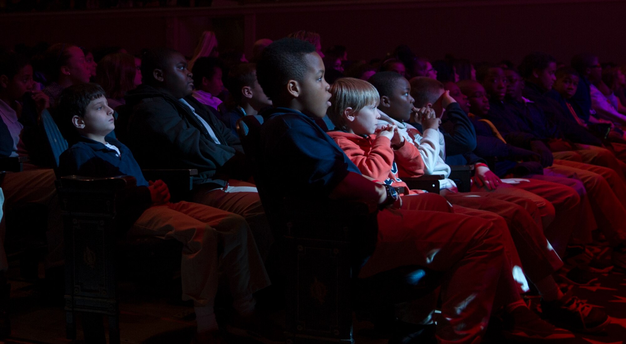 Children watch “The Spirit of the Season” holiday concert performed by the United States Air Force Band at the Daughters of the American Revolution concert hall in Washington, D.C., Dec, 12, 2014. (U.S. Air Force photo/ Senior Airman Mariah Haddenham)