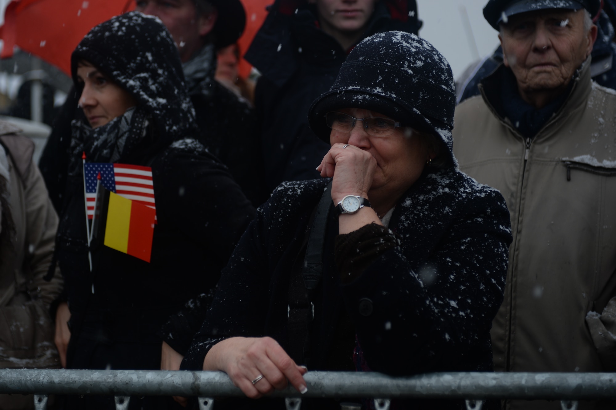 Jocelyne Gillis of Saint-Léger, Belgium, cries at the arrival of surviving World War II veterans before a ceremony in Bastogne, Belgium, Dec. 13, 2014. The veterans served during the Battle of the Bulge, a six-week campaign that liberated the city and signaled the coming surrender of Axis forces during the war. (U.S. Air Force photo by Staff Sgt. Joe W. McFadden/Released)