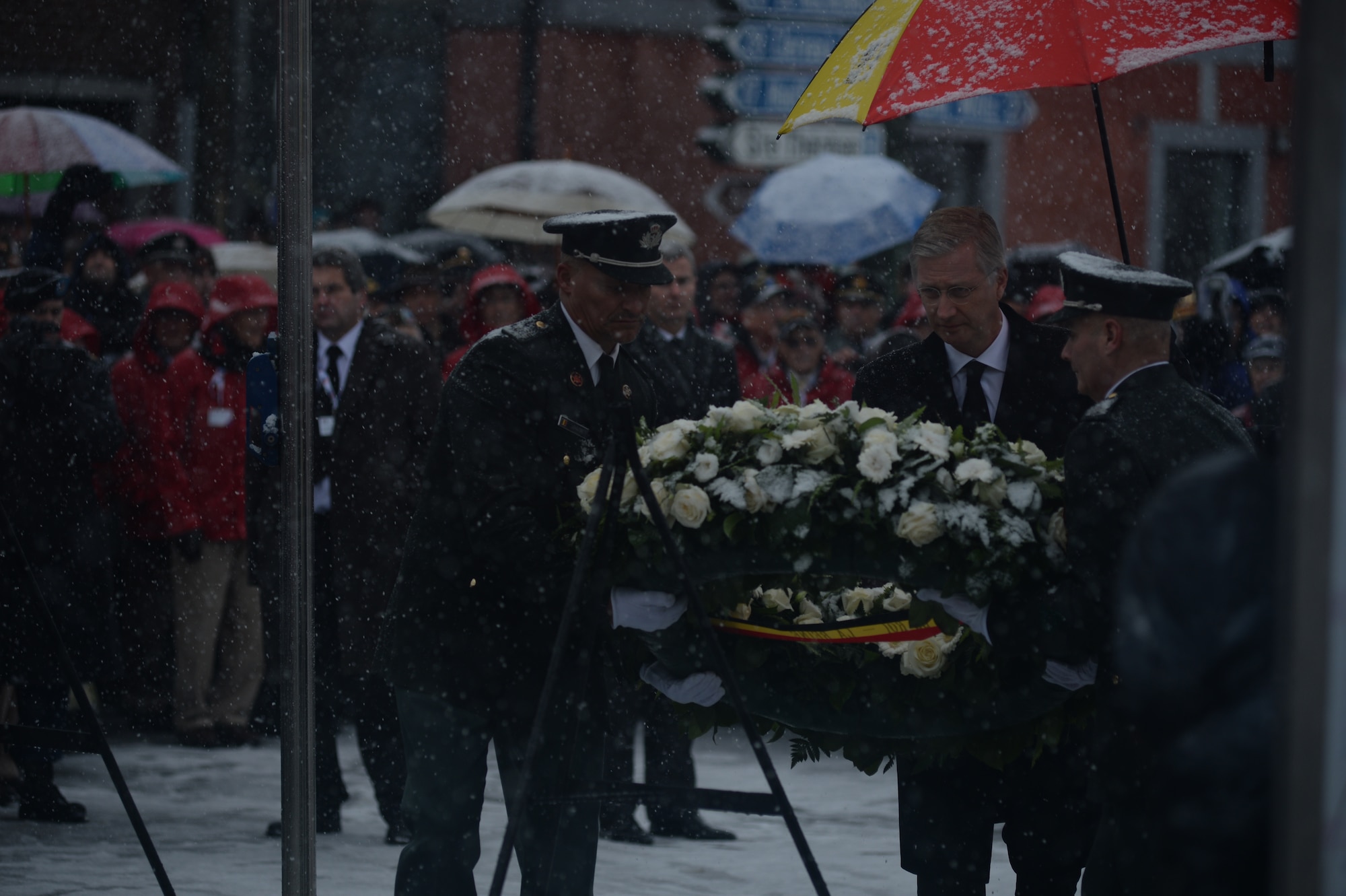 Belgian King Philippe lays a wreath aided by Belgian Army soldiers at the statue of U.S. Army Brig. Gen. Anthony McAuliffe, during a ceremony in Bastogne, Belgium, Dec. 13, 2014. More than 40,000 American and European citizens honored the service and legacy of more than 40 surviving World War II veterans as part of a 70th anniversary celebration of the Battle of the Bulge. (U.S. Air Force photo by Staff Sgt. Joe W. McFadden/Released)
