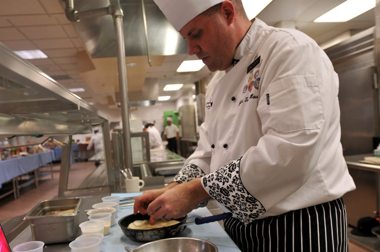 Army Sgt. Andrew Shurden prepares a potato dish during tryouts for the culinary arts team at Joint Base Lewis-McChord, Wash., Nov. 21, 2014. Soldiers selected for the team will compete in the Military Culinary Arts Training Event at Fort Lee, Va. U.S. Army photo by Sgt. James J. Bunn