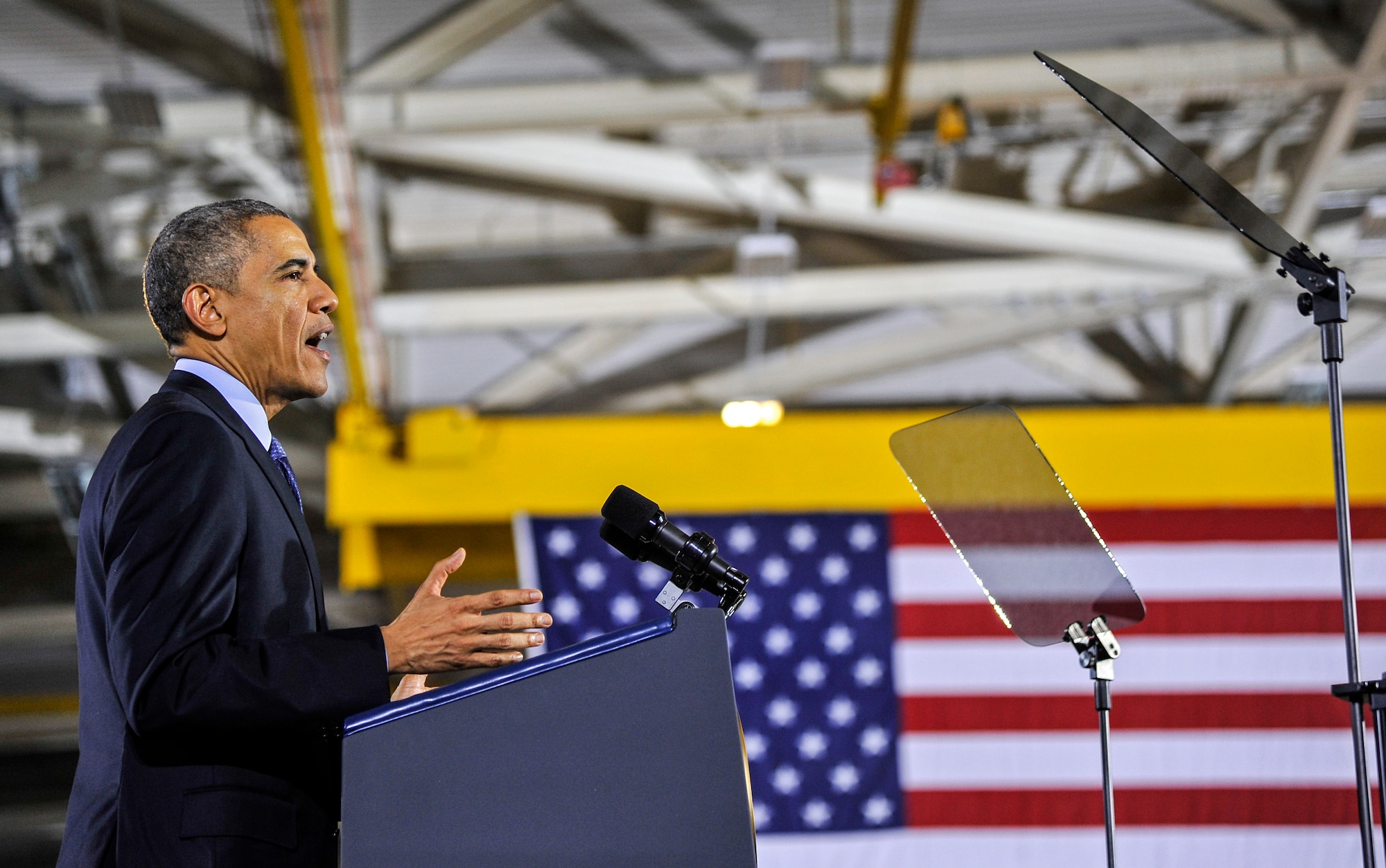 President Barack Obama addresses a crowd of service members and Defense Department civilians Dec. 15, 2014, at Joint Base McGuire-Dix-Lakehurst, N.J. The event allowed more than 3,000 military and civilian personnel to listen to their commander in chief discuss current conflicts and mission readiness, but more importantly thank the attendees for their service and dedication to their nation. (U.S. Air Force photo/Staff Sgt. Scott Saldukas)