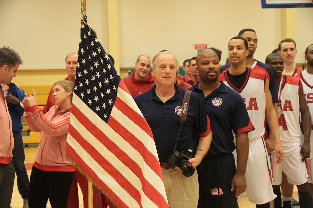 U.S. Armed Forces Men's Basketball team ready to receive their award after capturing the SHAPE International Basketball Championship by defeating Lithuania 89-82.  Photo courtesy of Patrick Ferriol, pfphotography.be