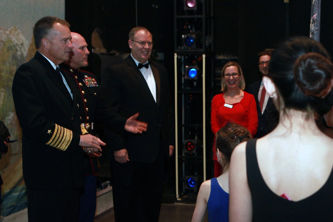 The Deputy Secretary of Defense Mr. Robert O. Work, the Vice Chairman of the Joint Chiefs of Staff Adm. James A. Winnefeld Jr., and the Sergeant Major of the Marine Corps Sgt. Maj. Micheal P. Barrett, participate in Septime Webre’s adaptation of “The Nutcracker” presented by The Washington Ballet at the Warner Theatre in Washington, D.C., during military appreciation night on Dec. 10, 2014. (U.S. Marine Corps photo by Sgt. Marionne T. Mangrum)