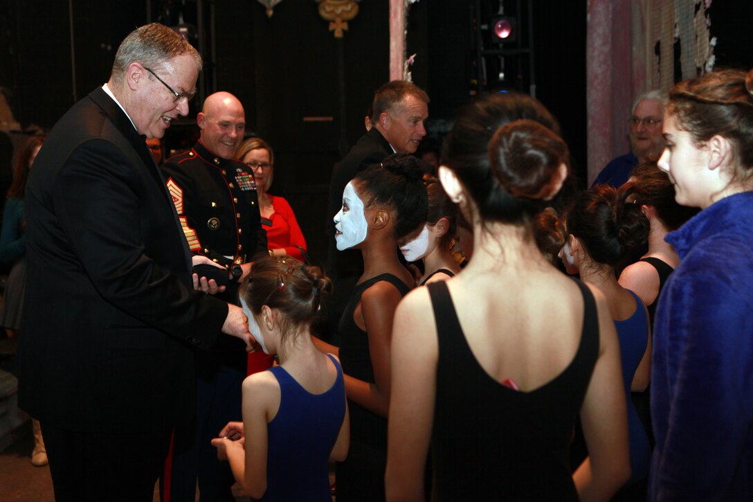The Deputy Secretary of Defense Mr. Robert O. Work, the Vice Chairman of the Joint Chiefs of Staff Adm. James A. Winnefeld Jr., and the Sergeant Major of the Marine Corps Sgt. Maj. Micheal P. Barrett, participate in Septime Webre’s adaptation of “The Nutcracker” presented by The Washington Ballet at the Warner Theatre in Washington, D.C., during military appreciation night on Dec. 10, 2014. (U.S. Marine Corps photo by Sgt. Marionne T. Mangrum)