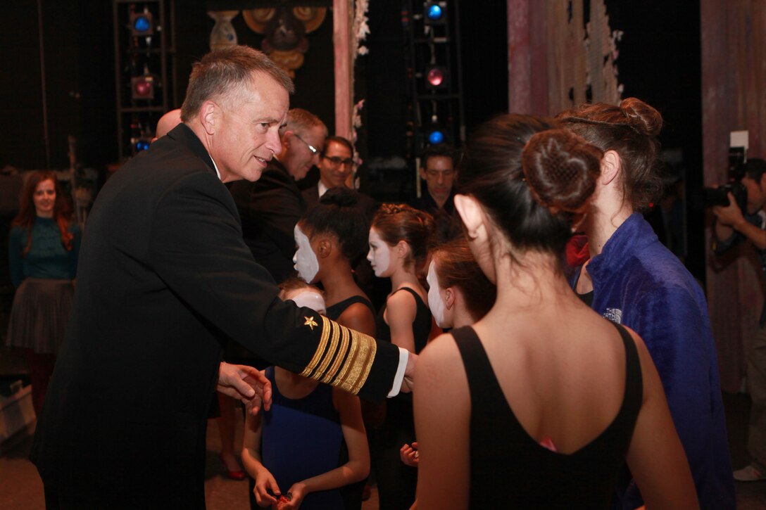 The Deputy Secretary of Defense Mr. Robert O. Work, the Vice Chairman of the Joint Chiefs of Staff Adm. James A. Winnefeld Jr., and the Sergeant Major of the Marine Corps Sgt. Maj. Micheal P. Barrett, participate in Septime Webre’s adaptation of “The Nutcracker” presented by The Washington Ballet at the Warner Theatre in Washington, D.C., during military appreciation night on Dec. 10, 2014. (U.S. Marine Corps photo by Sgt. Marionne T. Mangrum)