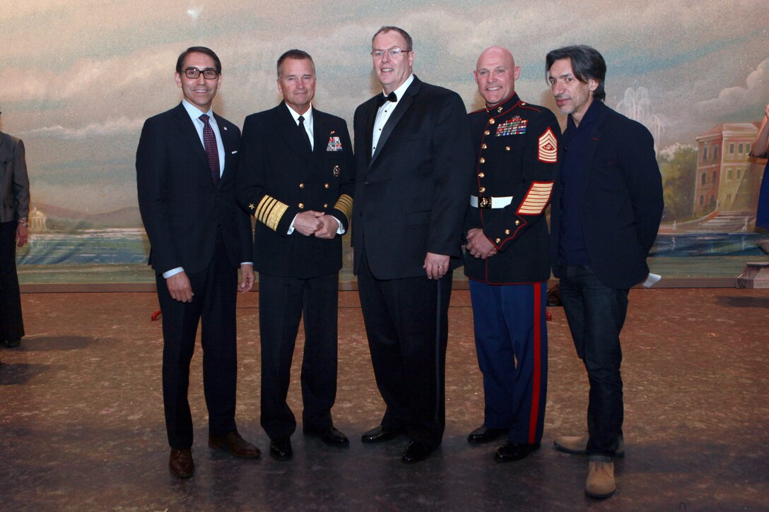 The Deputy Secretary of Defense Mr. Robert O. Work, the Vice Chairman of the Joint Chiefs of Staff Adm. James A. Winnefeld Jr., and the Sergeant Major of the Marine Corps Sgt. Maj. Micheal P. Barrett, participate in Septime Webre’s adaptation of “The Nutcracker” presented by The Washington Ballet at the Warner Theatre in Washington, D.C., during military appreciation night on Dec. 10, 2014. (U.S. Marine Corps photo by Sgt. Marionne T. Mangrum)