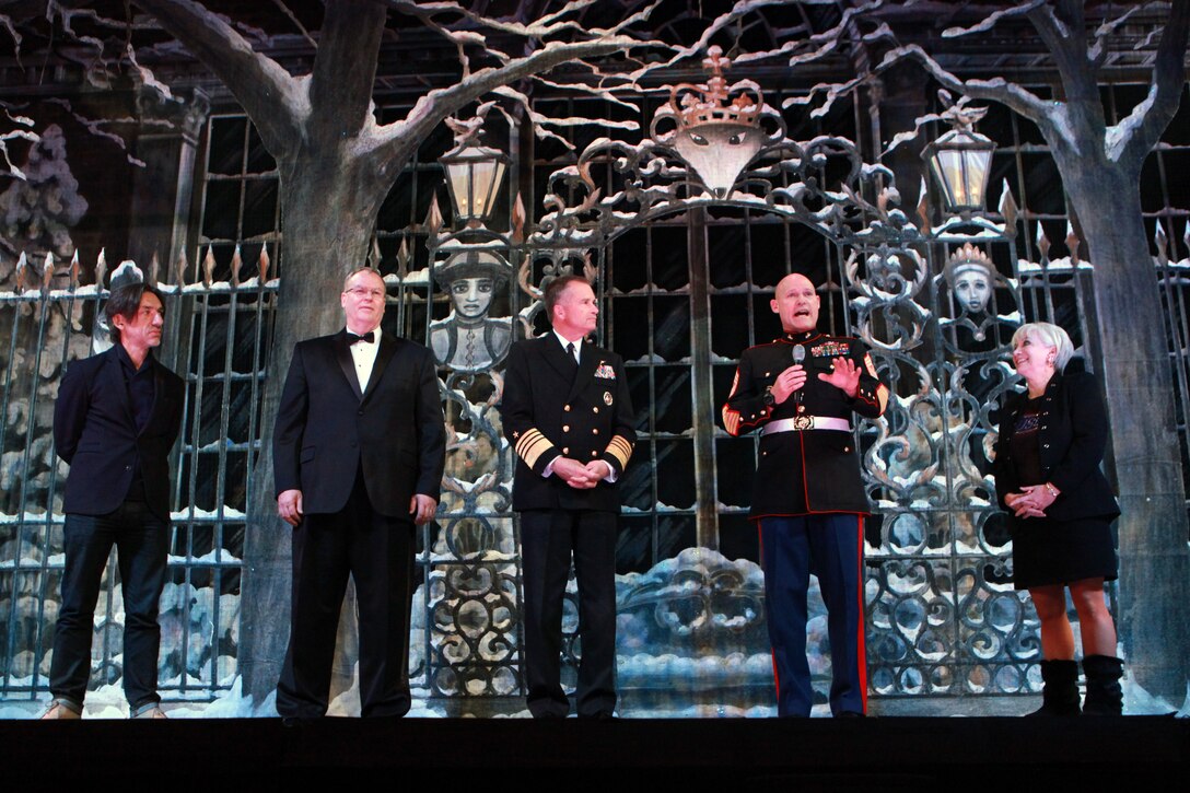 The Deputy Secretary of Defense Mr. Robert O. Work, the Vice Chairman of the Joint Chiefs of Staff Adm. James A. Winnefeld Jr., and the Sergeant Major of the Marine Corps Sgt. Maj. Micheal P. Barrett, participate in Septime Webre’s adaptation of “The Nutcracker” presented by The Washington Ballet at the Warner Theatre in Washington, D.C., during military appreciation night on Dec. 10, 2014. (U.S. Marine Corps photo by Sgt. Marionne T. Mangrum)