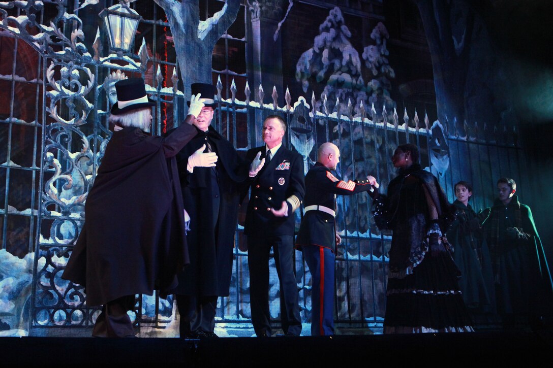 The Deputy Secretary of Defense Mr. Robert O. Work, the Vice Chairman of the Joint Chiefs of Staff Adm. James A. Winnefeld Jr., and the Sergeant Major of the Marine Corps Sgt. Maj. Micheal P. Barrett, participate in Septime Webre’s adaptation of “The Nutcracker” presented by The Washington Ballet at the Warner Theatre in Washington, D.C., during military appreciation night on Dec. 10, 2014. (U.S. Marine Corps photo by Sgt. Marionne T. Mangrum)