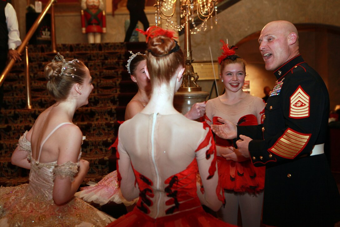 The Deputy Secretary of Defense Mr. Robert O. Work, the Vice Chairman of the Joint Chiefs of Staff Adm. James A. Winnefeld Jr., and the Sergeant Major of the Marine Corps Sgt. Maj. Micheal P. Barrett, participate in Septime Webre’s adaptation of “The Nutcracker” presented by The Washington Ballet at the Warner Theatre in Washington, D.C., during military appreciation night on Dec. 10, 2014. (U.S. Marine Corps photo by Sgt. Marionne T. Mangrum)