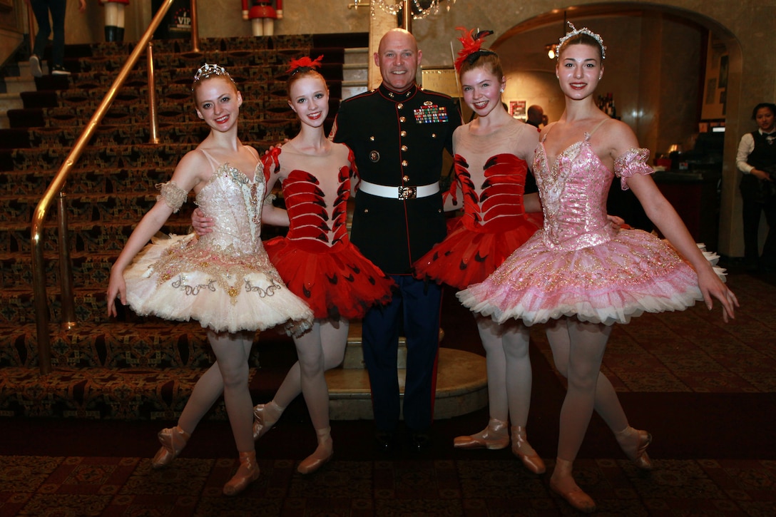 The Deputy Secretary of Defense Mr. Robert O. Work, the Vice Chairman of the Joint Chiefs of Staff Adm. James A. Winnefeld Jr., and the Sergeant Major of the Marine Corps Sgt. Maj. Micheal P. Barrett, participate in Septime Webre’s adaptation of “The Nutcracker” presented by The Washington Ballet at the Warner Theatre in Washington, D.C., during military appreciation night on Dec. 10, 2014. (U.S. Marine Corps photo by Sgt. Marionne T. Mangrum)