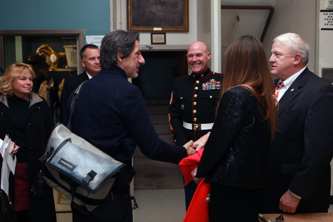 The Deputy Secretary of Defense Mr. Robert O. Work, the Vice Chairman of the Joint Chiefs of Staff Adm. James A. Winnefeld Jr., and the Sergeant Major of the Marine Corps Sgt. Maj. Micheal P. Barrett, participate in Septime Webre’s adaptation of “The Nutcracker” presented by The Washington Ballet at the Warner Theatre in Washington, D.C., during military appreciation night on Dec. 10, 2014. (U.S. Marine Corps photo by Sgt. Marionne T. Mangrum)