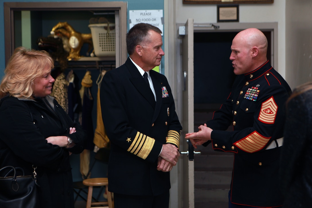 The Deputy Secretary of Defense Mr. Robert O. Work, the Vice Chairman of the Joint Chiefs of Staff Adm. James A. Winnefeld Jr., and the Sergeant Major of the Marine Corps Sgt. Maj. Micheal P. Barrett, participate in Septime Webre’s adaptation of “The Nutcracker” presented by The Washington Ballet at the Warner Theatre in Washington, D.C., during military appreciation night on Dec. 10, 2014. (U.S. Marine Corps photo by Sgt. Marionne T. Mangrum)