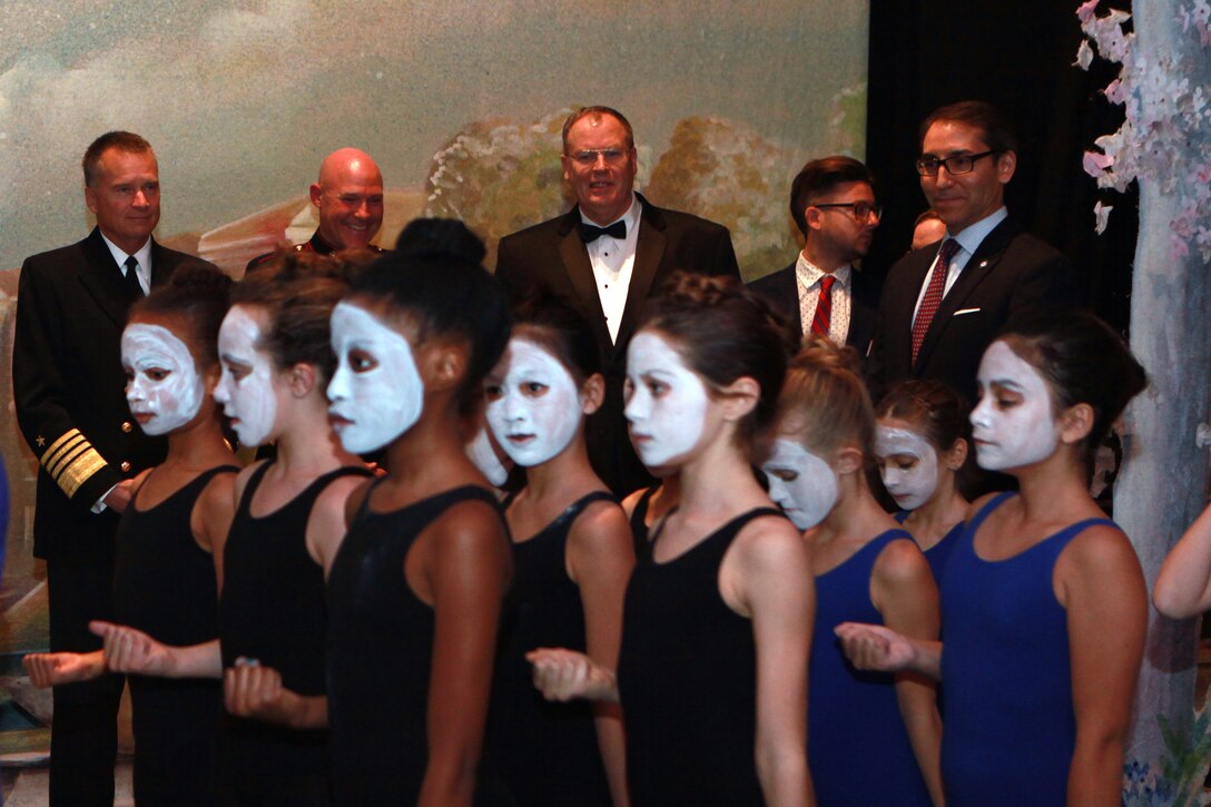 The Deputy Secretary of Defense Mr. Robert O. Work, the Vice Chairman of the Joint Chiefs of Staff Adm. James A. Winnefeld Jr., and the Sergeant Major of the Marine Corps Sgt. Maj. Micheal P. Barrett, participate in Septime Webre’s adaptation of “The Nutcracker” presented by The Washington Ballet at the Warner Theatre in Washington, D.C., during military appreciation night on Dec. 10, 2014. (U.S. Marine Corps photo by Sgt. Marionne T. Mangrum)