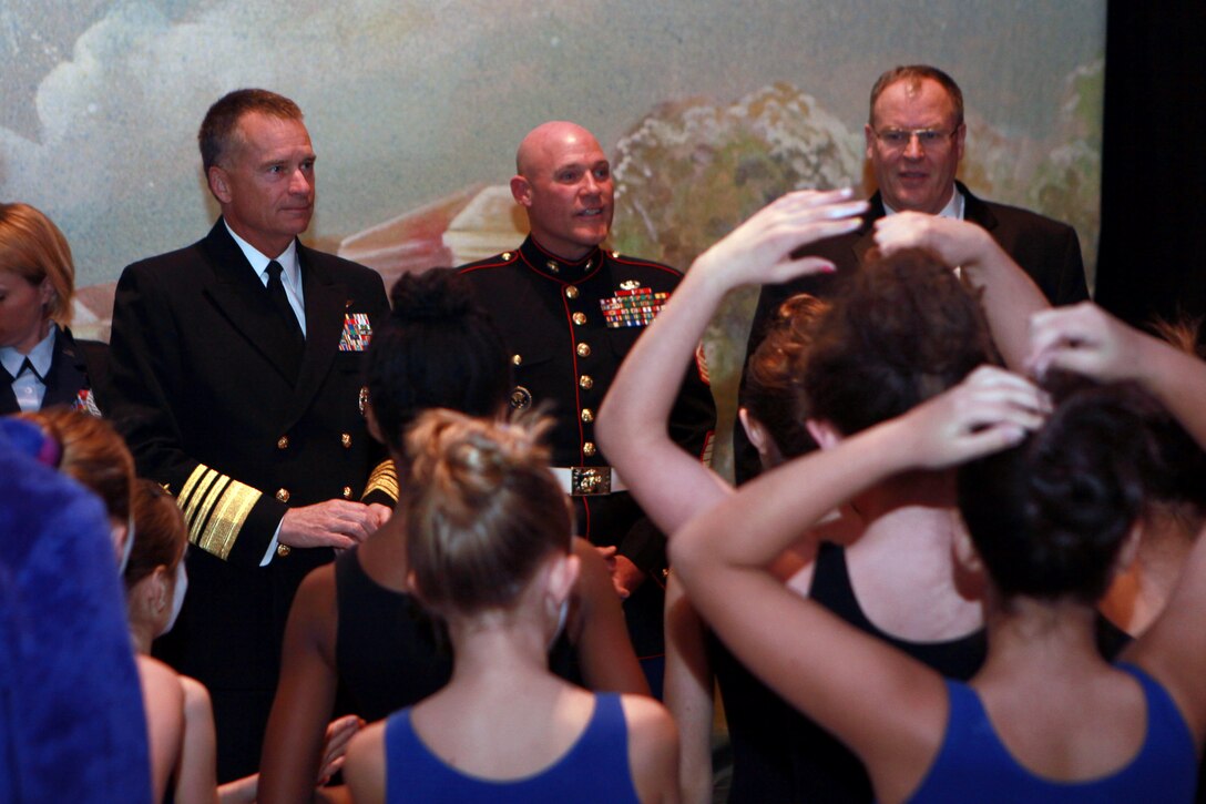 The Deputy Secretary of Defense Mr. Robert O. Work, the Vice Chairman of the Joint Chiefs of Staff Adm. James A. Winnefeld Jr., and the Sergeant Major of the Marine Corps Sgt. Maj. Micheal P. Barrett, participate in Septime Webre’s adaptation of “The Nutcracker” presented by The Washington Ballet at the Warner Theatre in Washington, D.C., during military appreciation night on Dec. 10, 2014. (U.S. Marine Corps photo by Sgt. Marionne T. Mangrum)