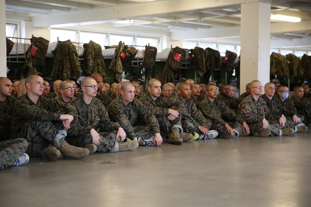 Recruits of Bravo Company, 1st Recruit Training Battalion, watch a demonstration of how to employ bayonets during a Marine Corps Martial Arts Program class at Marine Corps Recruit Depot San Diego Calif., Dec. 9. Part of this training focused on how to fix bayonets to the M16-A4 Service Rifle and utilize it in close quarters combat.  