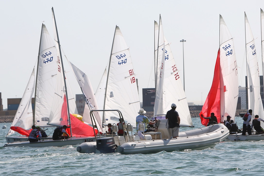 Men’s skipper Coast Guard Lt. j.g. Samuel Ingham of Naval Air Station Pensacola, Fla. and Coast Guard Lt. j.g. Sean Kelly of San Francisco Sector, Calif. at the start of the race during the 47th CISM World Military Sailing Championship held in Doha, Qatar Nov. 22-29, 2015.