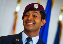 Master Sgt. Ivan Ruiz, a pararescueman from the 56th Rescue Squadron, Royal Air Force Lakenheath, England, smiles after being presented the Air Force Cross for extraordinary heroism in combat during a ceremony at the Freedom Hangar on Hurlburt Field, Fla., Dec. 17, 2014. The Air Force Cross is the second highest U.S. military decoration a member of the Air Force can receive. The last six Air Force Crosses have all been awarded to AFSOC Special Tactics Airmen.  (U.S. Air Force photo/Senior Airman Christopher Callaway) 