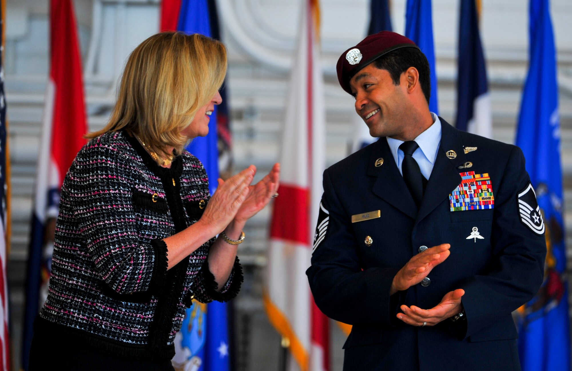 Secretary of the Air Force Deborah Lee James congratulates Master Sgt. Ivan Ruiz, a pararescueman from the 56th Rescue Squadron, Royal Air Force Lakenheath, England, on receiving the Air Force Cross at the Freedom Hangar on Hurlburt Field, Fla., Dec. 17, 2014. Ruiz is the sixth U.S. military member to receive the nation’s second highest military decoration since 9/11. The last six Air Force Crosses have all been awarded to AFSOC Special Tactics Airmen. (U.S. Air Force photo/Senior Airman Christopher Callaway) 