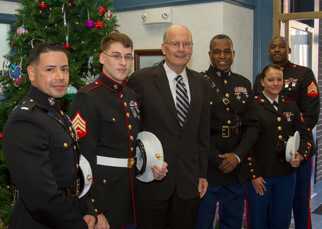 ALEXANDRIA, Va. (Dec. 17, 2014) – Reserve Marines attached to the Marine Corps Recruiting Command in Quantico, Va., pose for a photo with Vice Adm. Norbert R. Ryan Jr., USN (Ret), President and CEO of the Military Officers Association of America, during a Toys For Tots collection event at the MOAA headquarters here, today.  Marines pictured from left to right are: 1st Lt. Jose Valle, Sgt. Spencer Besancon, Lt. Col. David Rodgers, Cpl. Kimberly Kent, and Sgt. Joe Randall.