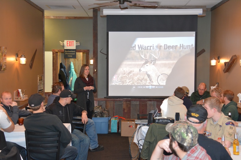 SPRING VALLEY, Wis. – Kelli Phillips, Eau Galle Recreation Area manager, talks about honoring veterans during a dinner with Corps employees, veterans and hunters Dec. 12. The group gathered at the Eau Galle Recreation Area, near Spring Valley, Wis., Dec. 13, for the third annual deer hunt. The Corps partnered with the Wounded Warrior Project and the Wisconsin Department of Natural Resources to host the event. The goal was to connect veterans with other veterans and honor them for their service while also managing the deer herd in the recreation area.