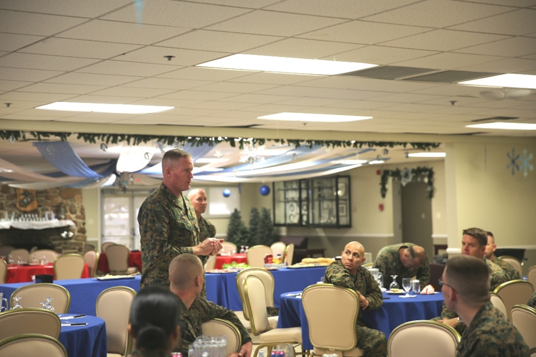 Brigadier General Edward D. Banta, commanding general of Marine Corps Installations West on Marine Corps Base Camp Pendleton and Sergeant Maj. Scott R. Helms, sergeant major of MCI West on MCB Camp Pendleton, visits Marine Corps Logistics Base Barstow, Calif., Dec. 16. During his visit, Banta had lunch with the Marines here, talked to them and answered questions they had about the future of the base and the Marine Corps. 