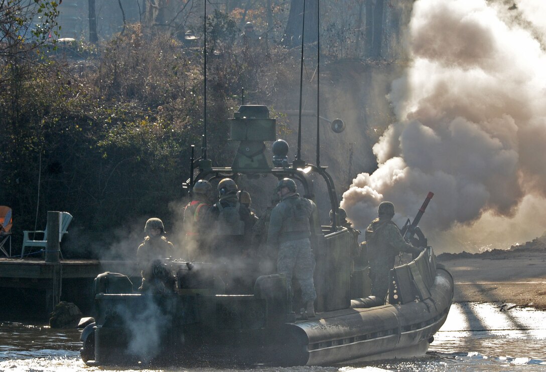 San Diego, CA-based Sailors get realistic training on the Cape Fear River from instructors of the Center for Security Forces Learning Site Camp Lejeune. The Navy uses facilities at the Wilmington District's Lock and Dam 2 that provide a staging area for operations. In addition, a fenced in area provides security for team members and their equipment. (USACE images by Hank Heusinkveld)
