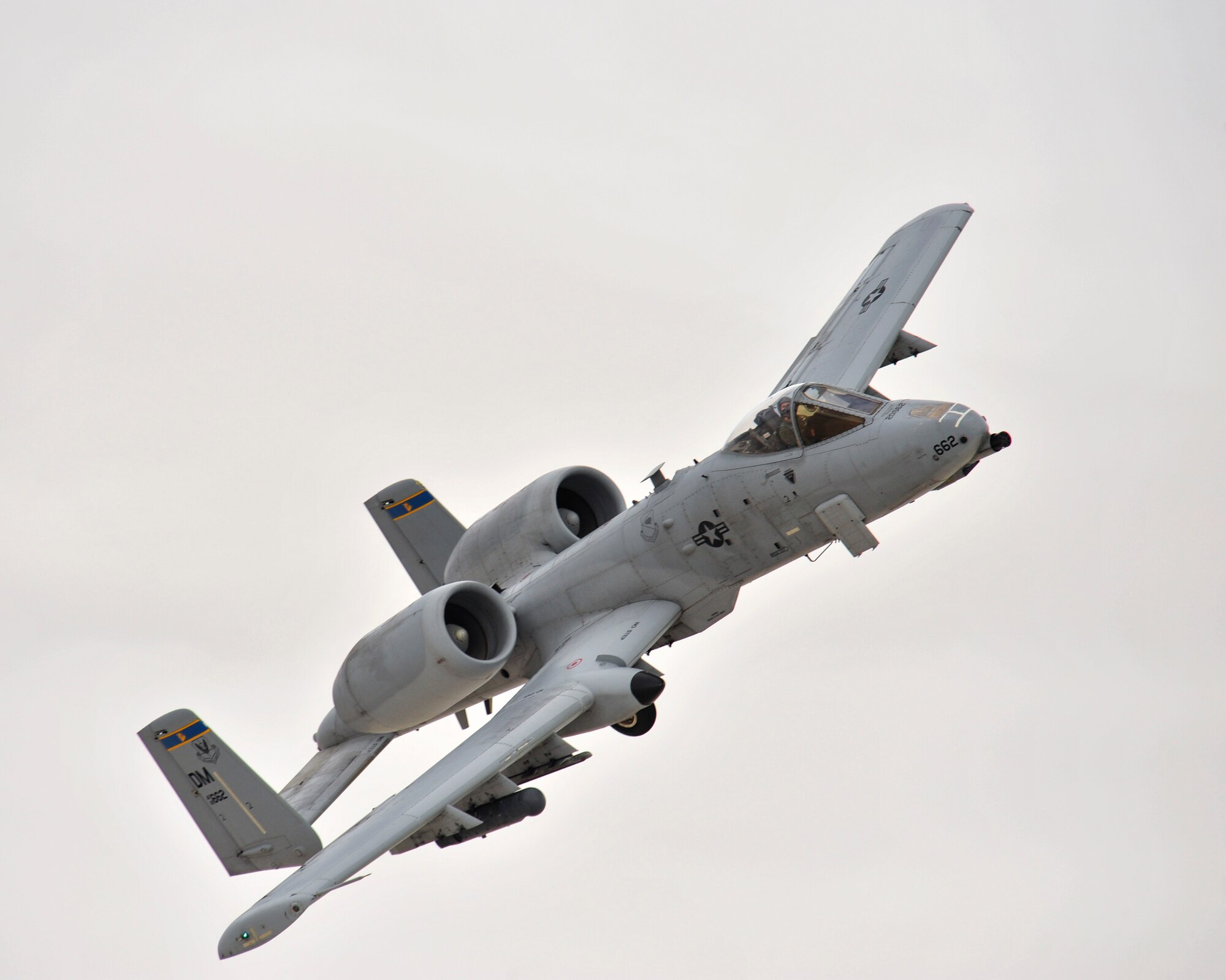 An A-10C Thunderbolt II from Davis-Monthan Air Force Base, Ariz., flies overhead during a training flight at White Sands Missile Range, N.M., Dec. 3, 2014.  The austere conditions of the missile range allow for pilots to get a close simulation of a deployed environment.  (U.S. Air Force photo by Airman 1st Class Chris Massey/Released)