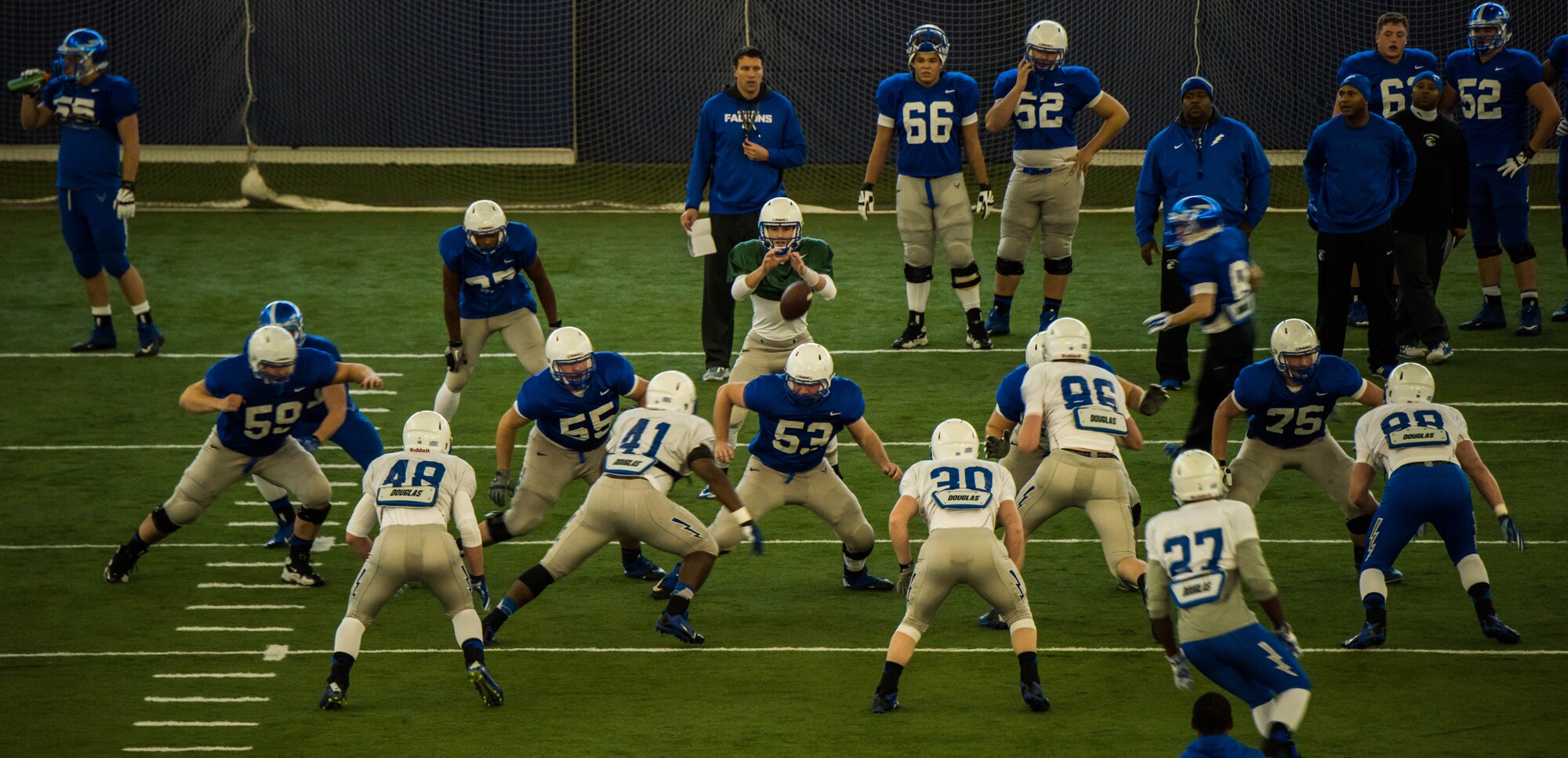 The Air Force Falcons run warm up snaps during practice for the Famous Idaho Potato Bowl Dec. 17, 2014, at the Caven Williams Sports Complex, Idaho. The Famous Idaho Potato Bowl is an annual event having been held since 1997.(U.S. Air Force photo by Airman Connor J. Marth/RELEASED)