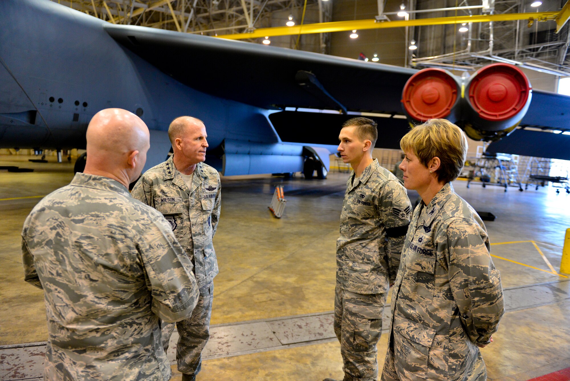 Lt. Gen. Stephen Wilson, commander of Air Force Global Strike Command, visits the 2nd Maintenance Squadron phase hangar on Barksdale Air Force Base, La., Dec. 16, 2014. A periodic inspection is performed on all aircraft with more than 450 flight hours. Access panels are removed and inspected by engineers. Each inspection is a 14-day phase starting with panel removal and 11 maintenance flights inspect each component of the aircraft looking for defects. (U.S. Air Force photo/Airman 1st Class Mozer O. Da Cunha) 