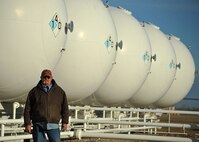 Kenneth Palm, 319th Civil Engineer Squadron heating ventilation and air conditioning maintenance mechanic, was named the 2014 Air Force Outstanding Civil Engineer Manager of the Year. Palm operates Air Mobility Command’s only synthetic natural gas plant operations. (U.S. Air Force photo/Senior Airman Xavier Navarro)