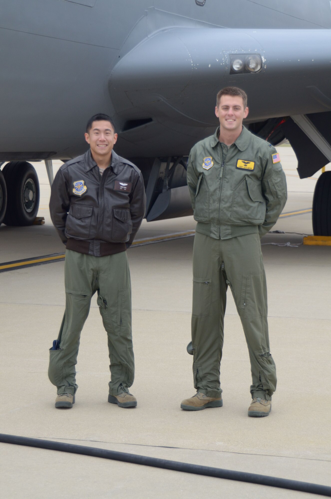 1st Lt. Cody Hoylman and Capt. James Quon, both pilots for the 906th Air Refueling Squadron assigned to the 126 Air Refueling Wing, Scott Air Force Base, Ill., were recently selected for the initial operational test and evaluation aircrew for the KC-46 Pegasus. The active duty Air Force pilots currently fly the KC-135R Stratotanker for the Illinois Air National Guard under an Active Association. (Air National Guard photo by Senior Airman Elise Stout)