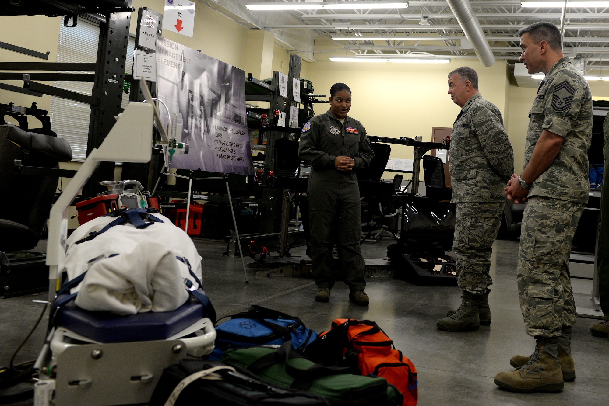 Lt. Gen. Thomas Travis, Air Force Surgeon General, visited Scott Air Force Base, Ill. for the first time Dec. 8, 2014. General Travis toured the many clinics in the 375th Medical Group Dec. 10, 2014 after speaking about leadership at a 375th MDG all-call. Throughout the day, he recognized many airmen for the hard work they have accomplished. Members of the 375th MDG also briefed General Travis about their clinic’s mission and goals. General Travis had a chance to visit the 375th Aeromedical Evacuation Squadron and Belleville Family Clinic as well. (U.S. Air Force photo/ Airman 1st Class Kiana Brothers) 