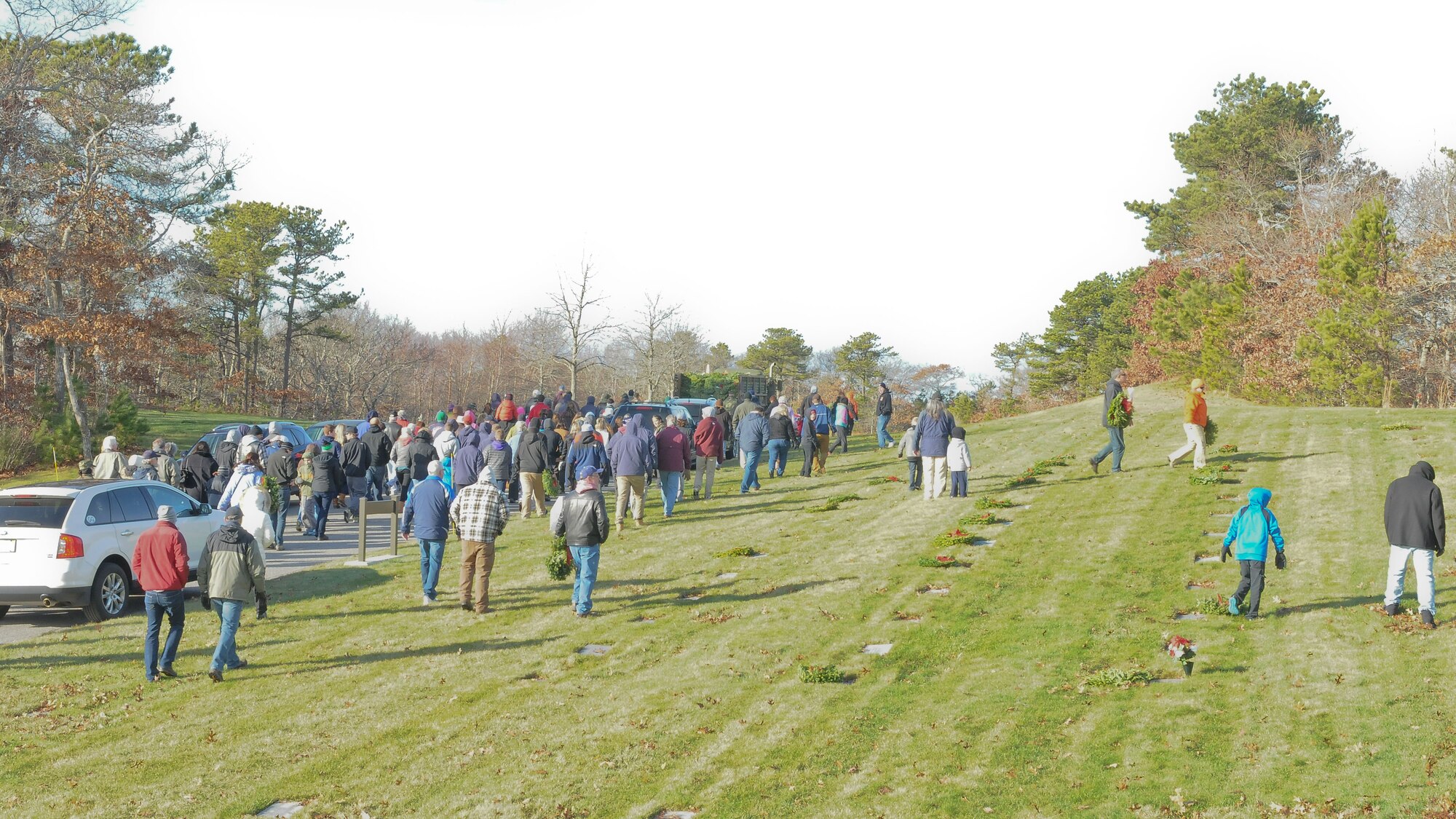 More than 10 organizations and dozens of volunteers took part in the annual Wreaths Across America event at the National Cemetery in Bourne, Massachusetts on December 13,2014. Together, all involved layed more than 4,400 wreaths on the graves of those buried in the cemetery.