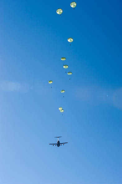 Airmen from the 820th Base Defense Group perform static-line jumps Dec. 12, 2014, over Moody Air Force Base, Ga. The 820th BDG jumps regularly to maintain their readiness and capabilities. (U.S. Air Force photo by Airman 1st Class Ryan Callaghan/Released)
