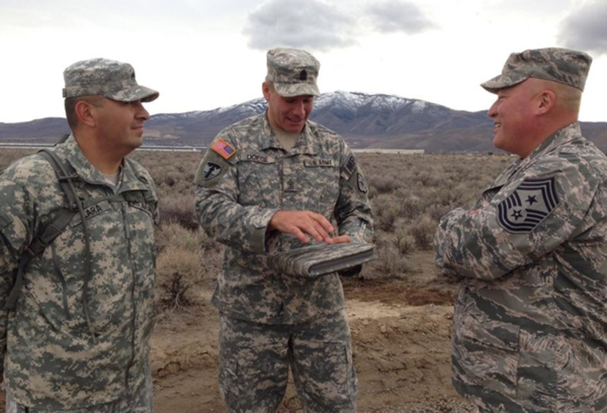 Air Force Chief Master Sgt. Mitchell Brush, right, the senior enlisted advisor to the chief of the National Guard Bureau, meets with Nevada Army Guard Soldiers 1st Sgt. Elbie Doege, center, and Staff Sgt. Rutilio Lara in Reno in early December.

Photo courtesy NV ARNG 106th Public Affairs Detachment
