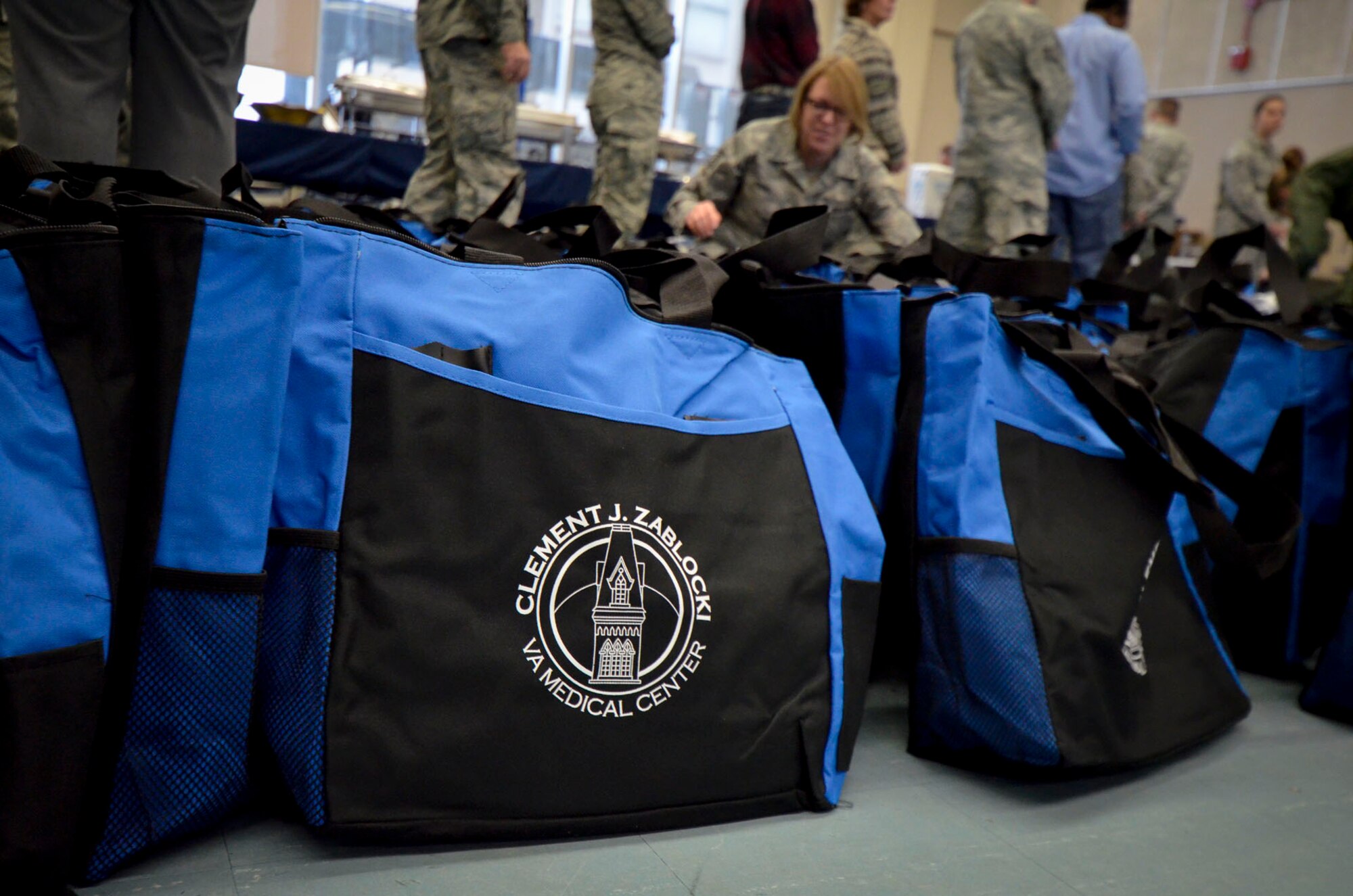 U.S. Airmen with the 128th Air Refueling Wing volunteered to help pass out gifts to patients at the Clement J. Zablocki VA Medical Center, Milwaukee Dec. 10, 2014.  (U.S. Air National Guard photo by Tech. Sgt. Jenna Lenski/Released)