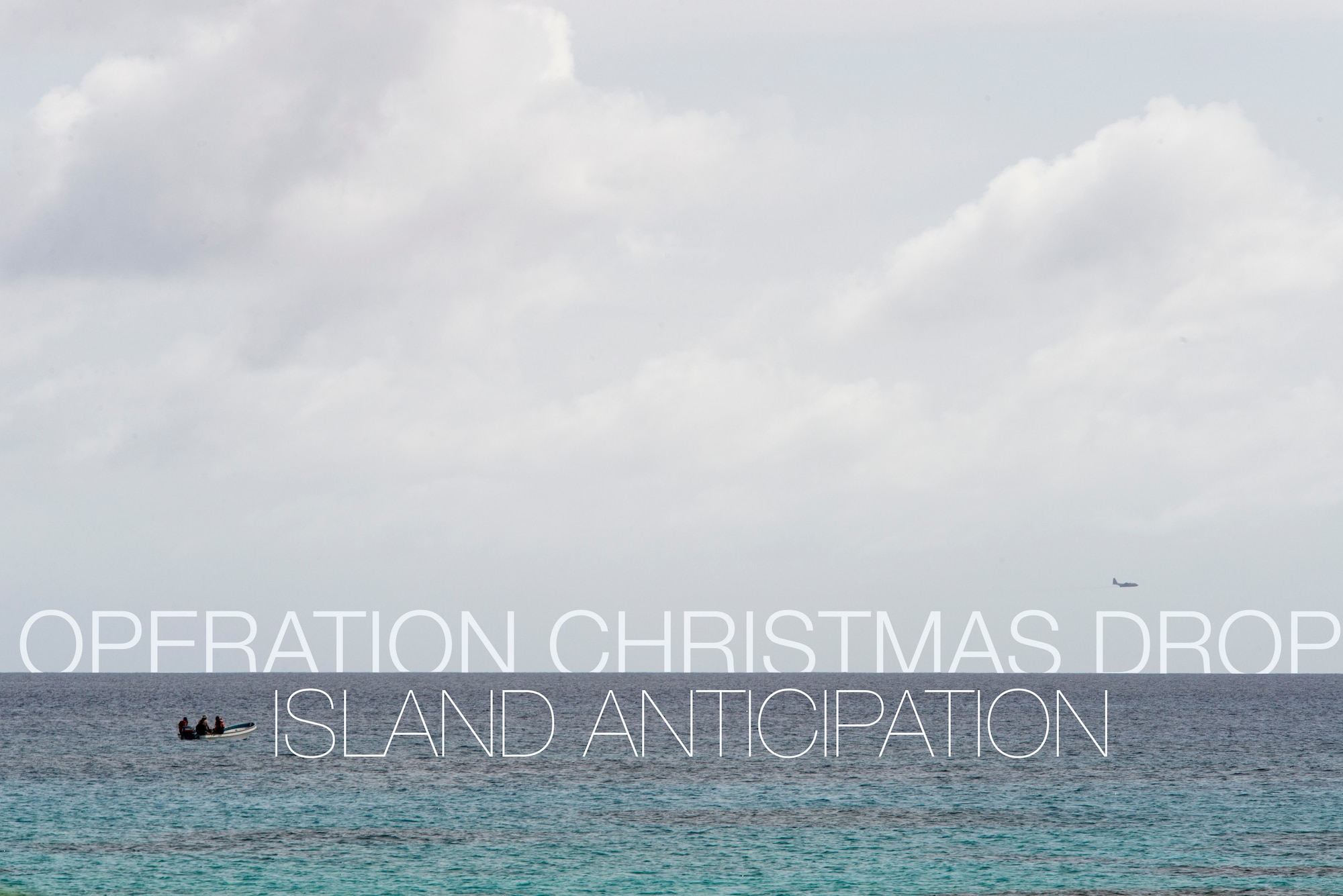 Islanders on a small fishing boat watch a C-130 Hercules fly overhead during Operation Christmas Drop at Ulithi Atoll, Micronesia, Dec. 9, 2014. The aircraft belongs to the 374th Airlift Wing at Yokota Air Base, Japan, and it assisted with the delivery of 50,000 pounds of donated goods in 92 bundles to 56 Micronesian islands during OCD 2014. The effort is a combined coordination between members of the 36th Wing, Andersen Air Force Base, Guam, the 374 AW and members of the 515th Air Mobility Operations Wing. (U.S. Air Force graphic by Staff Sgt. Cody H. Ramirez/Released)