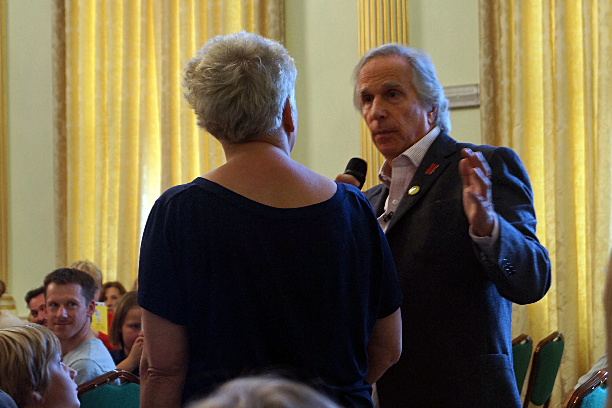 Henry Winkler – better known as "the Fonz" to American television audiences – speaks at the Children's Literature Festival in Bath, England, Sept. 28, 2014. Winkler is the author of a series of children’s books following Hank Zipzer, a fourth-grade boy with dyslexia. (U.S. Air Force photo by Tech. Sgt. Eric Burks/Released)