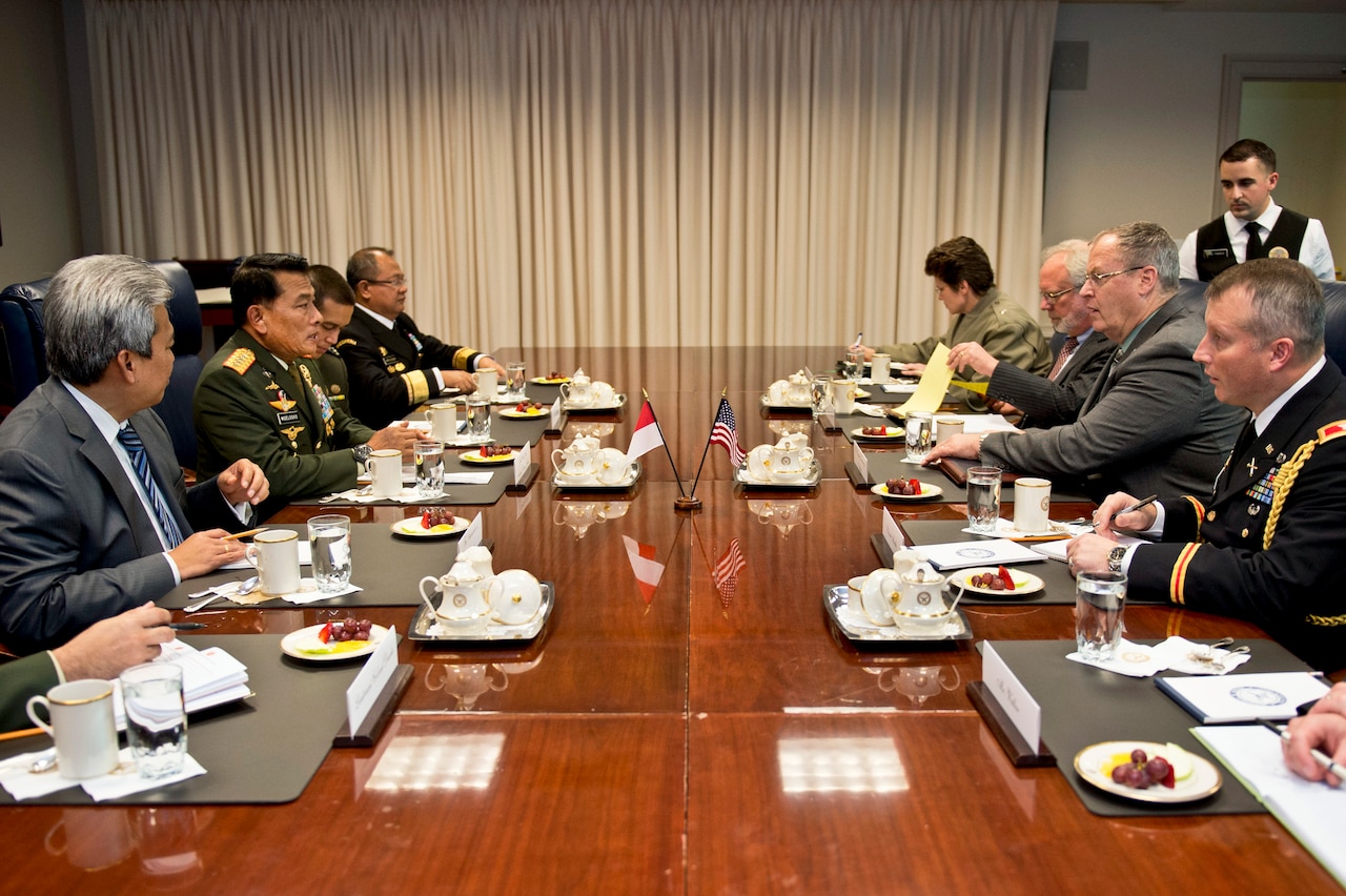 U.S. Deputy Defense Secretary Bob Work, second from right, meets with Indonesian Armed Forces Chief Gen. Moeldoko, second from left, to discuss matters of mutual importance at the Pentagon, Dec. 16, 2014. DoD photo by U.S. Air Force Master Sgt. Adrian Cadiz 
