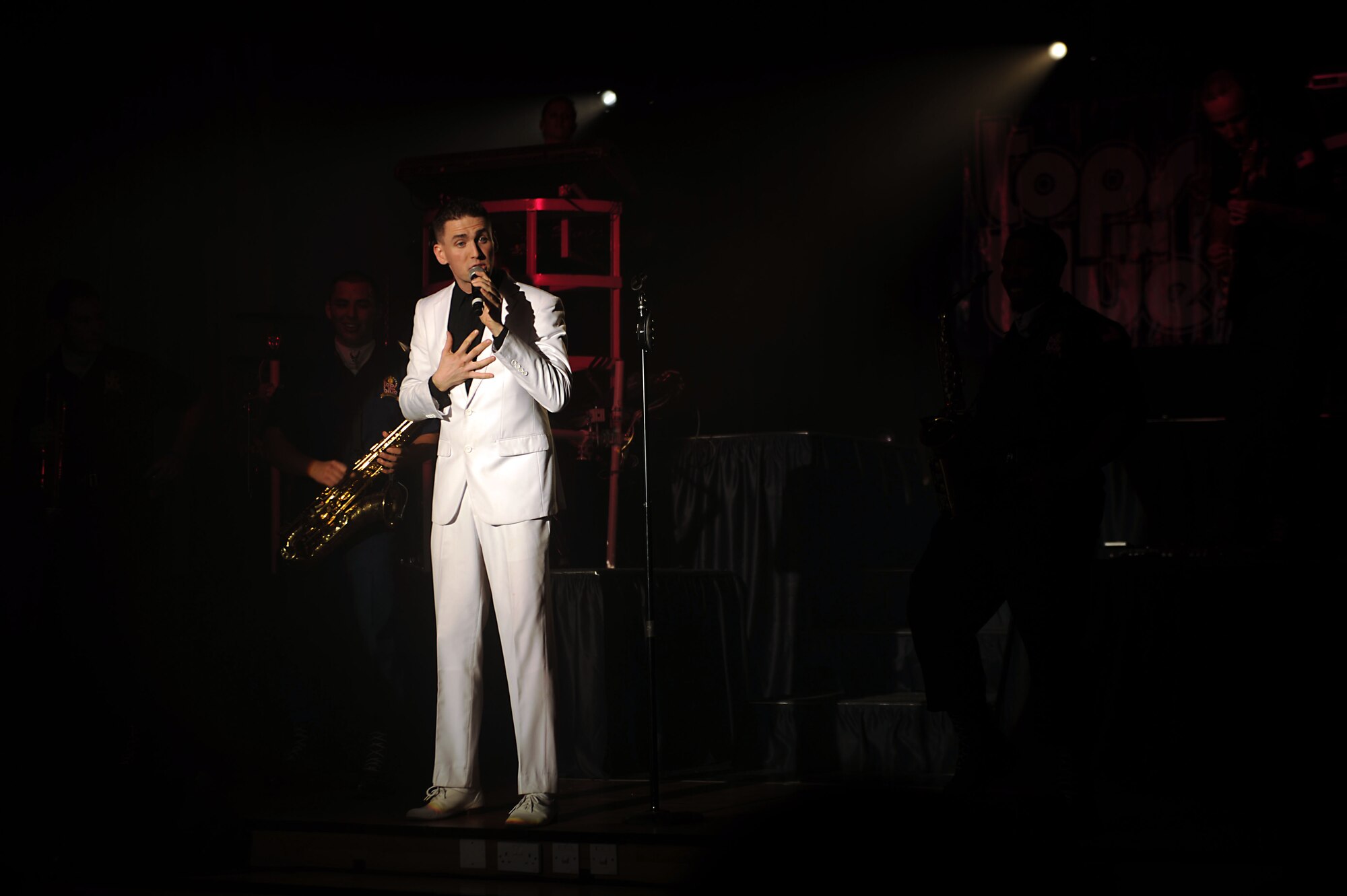 Tops in Blue performs for the 386th Air Expeditionary Wing at The Rock on Dec. 16, 2014. The group performed popular music from a variety of genres. (U.S. Air Force photo by Master Sgt. Eric Petosky)