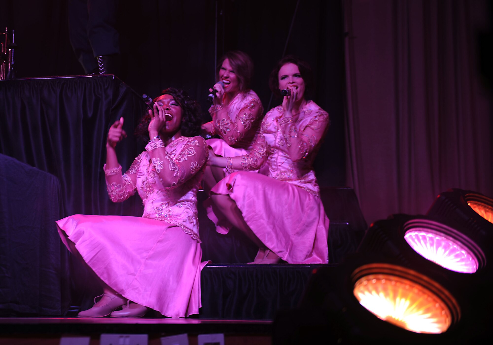 Tops in Blue performs for the 386th Air Expeditionary Wing at The Rock on Dec. 16, 2014. The group performed popular music from a variety of genres. (U.S. Air Force photo by Master Sgt. Eric Petosky)