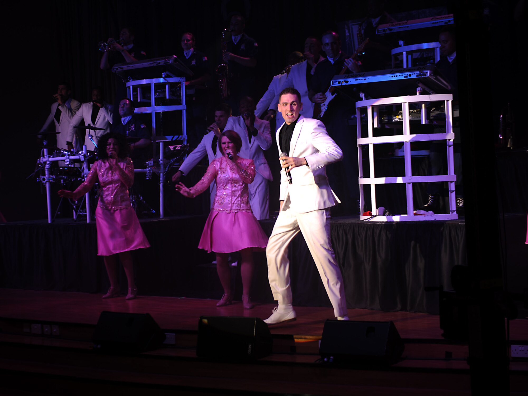 Tops in Blue performs for the 386th Air Expeditionary Wing at The Rock on Dec. 16, 2014. The group performed popular music from a variety of genres. (U.S. Air Force photo by Master Sgt. Eric Petosky)
