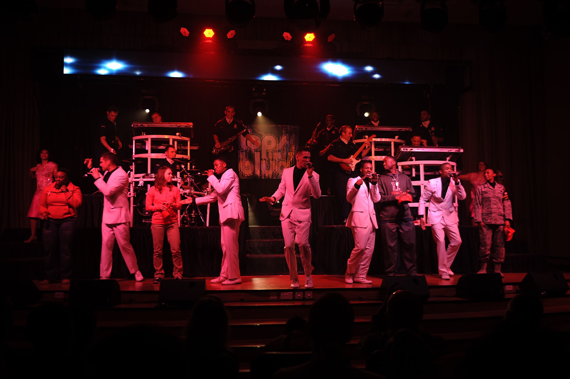 Tops in Blue performs for the 386th Air Expeditionary Wing at The Rock on Dec. 16, 2014. The group performed popular music from a variety of genres. (U.S. Air Force photo by Master Sgt. Eric Petosky)