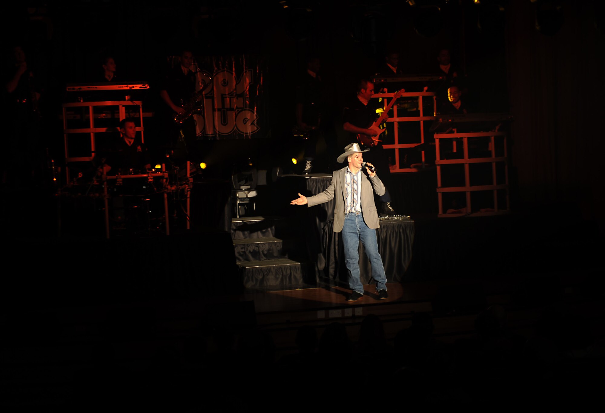 Tops in Blue performs for the 386th Air Expeditionary Wing at The Rock on Dec. 16, 2014. The group performed popular music from a variety of genres. (U.S. Air Force photo by Master Sgt. Eric Petosky)